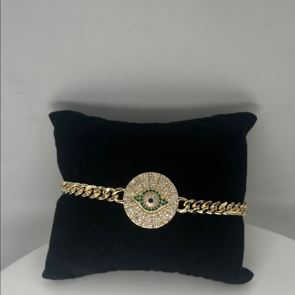 045. 18k Gold Plated Evil Eye Bracelet with green accents 7 1/4”